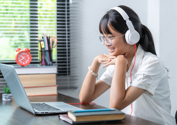 tutor looking at computer
